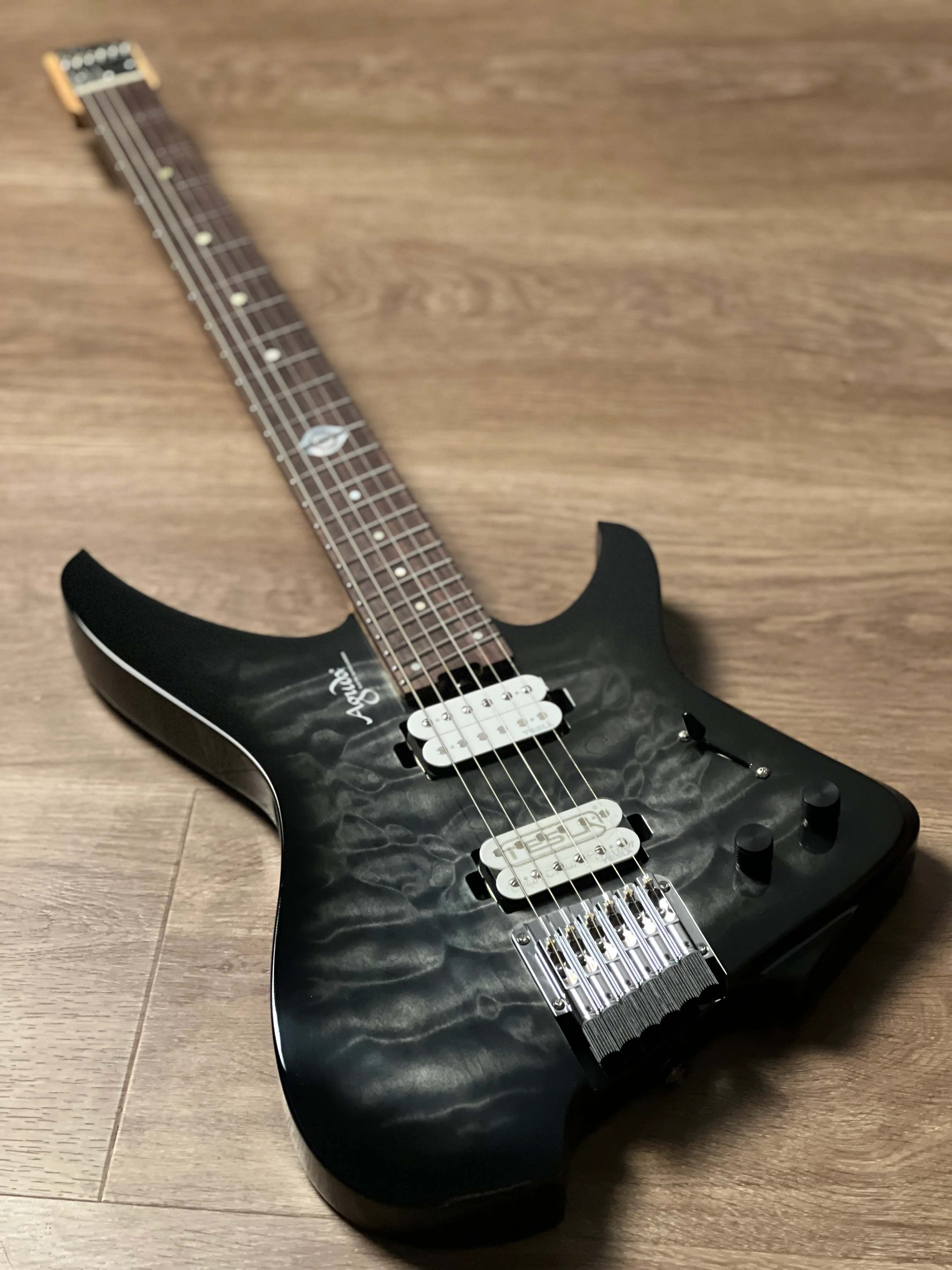 Aguda Black Hole Deluxe in Transparent Black Burst with Quilt Top and White Pickups