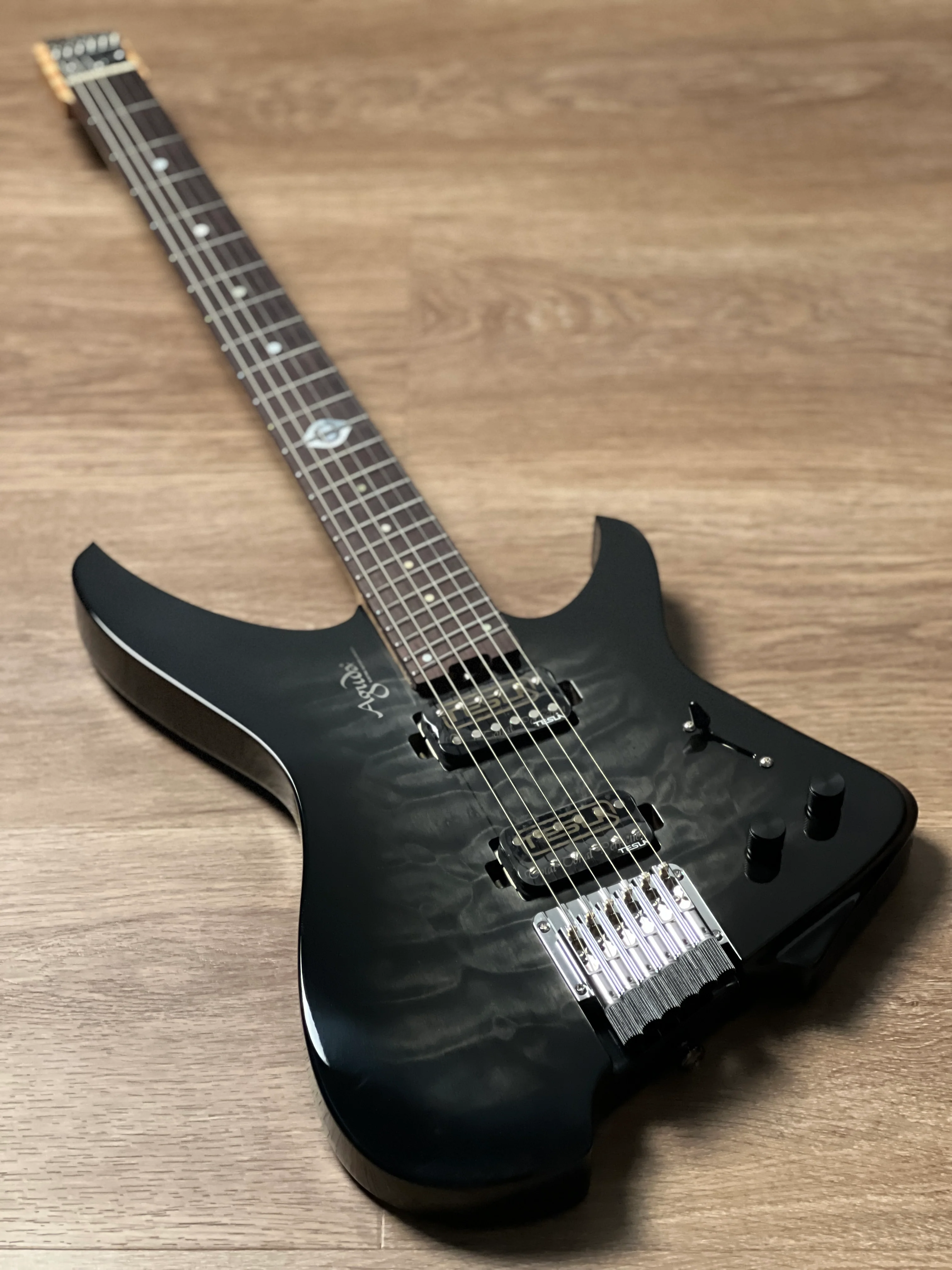Aguda Black Hole Deluxe in Transparent Black Burst with Quilt Top and Black Pickups