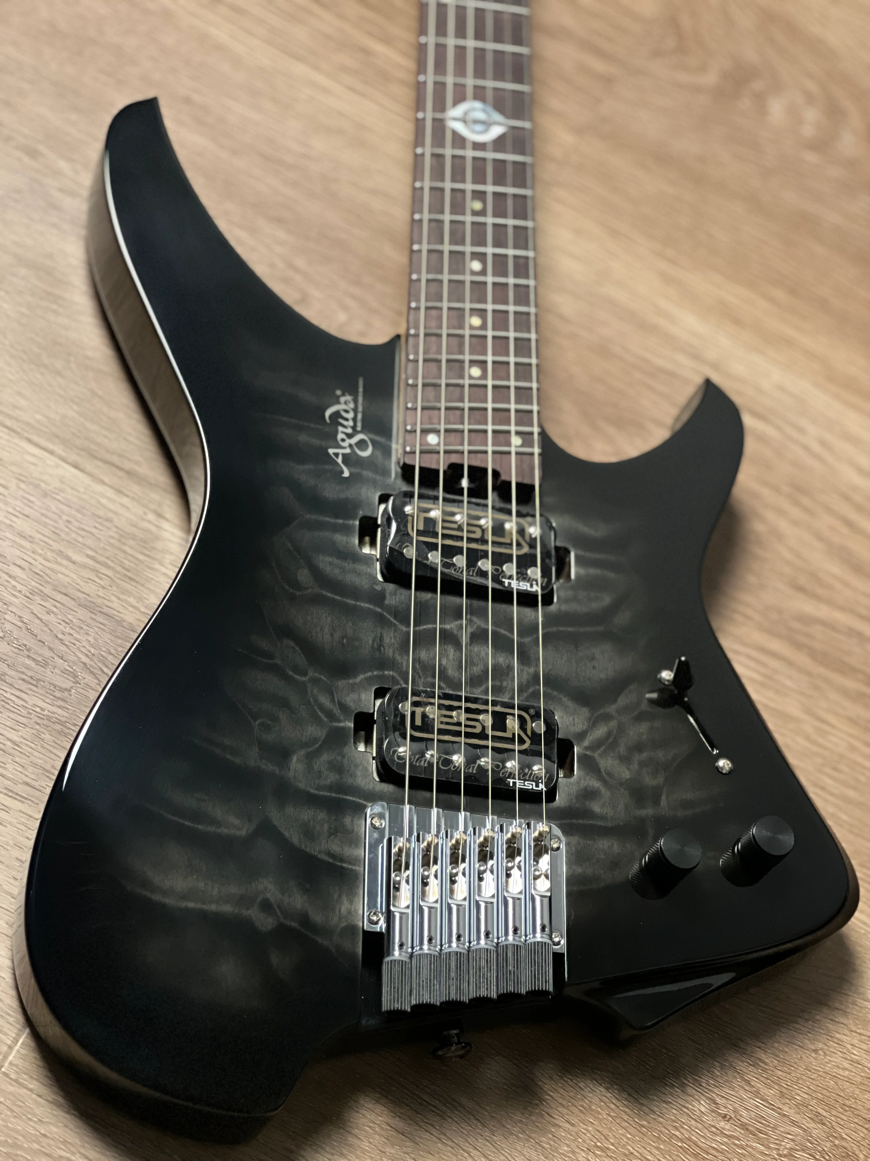 Aguda Black Hole Deluxe in Transparent Black Burst with Quilt Top and Black Pickups - Image 4