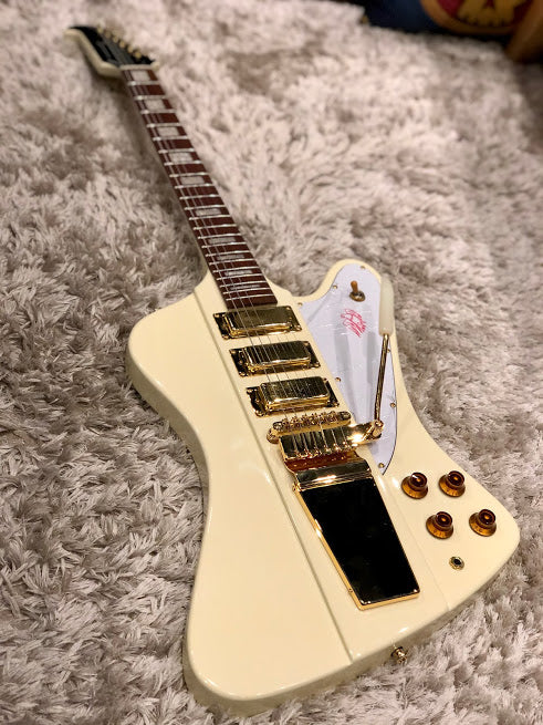 Tokai FB90 AI in Antique Ivory Firebird with Vibrola
